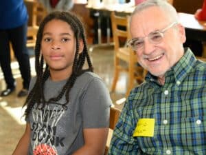 A volunteer math tutor and student.