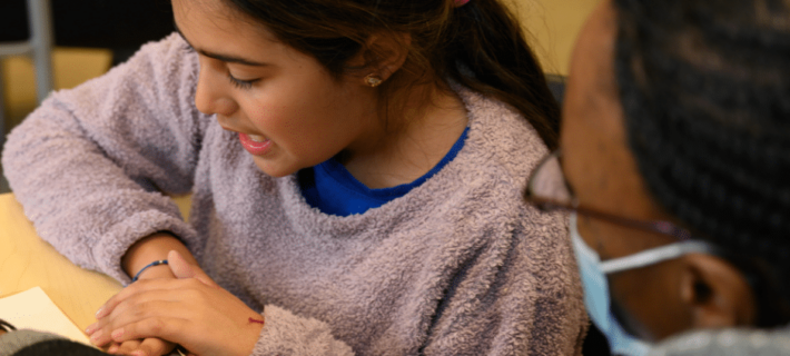 Latina student with tutor - Hispanic Heritage Month 2023