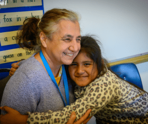 Circle of Care Blog_Girl hugging tutor