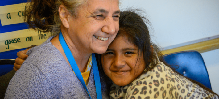 Circle of Care Blog_Girl hugging tutor