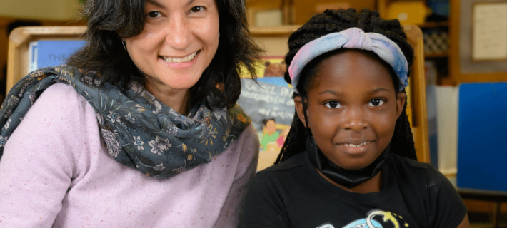 Succeding by Reading tutor Julie Lonergan and reading student.